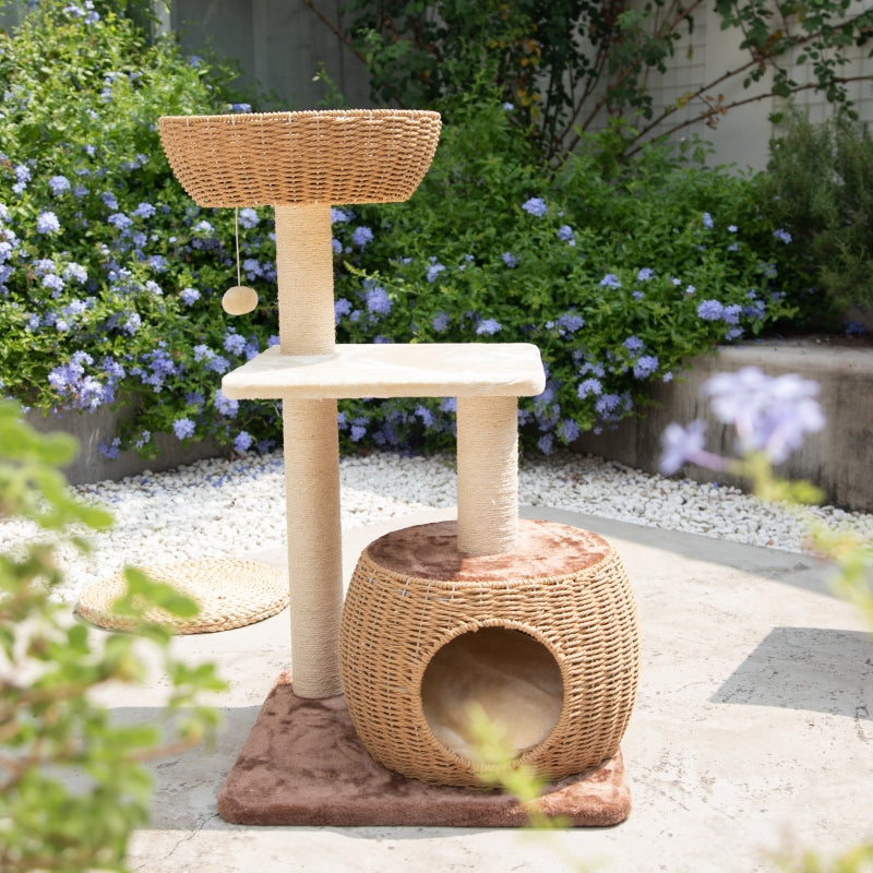 Brown Rattan Cat Tree in the yard.