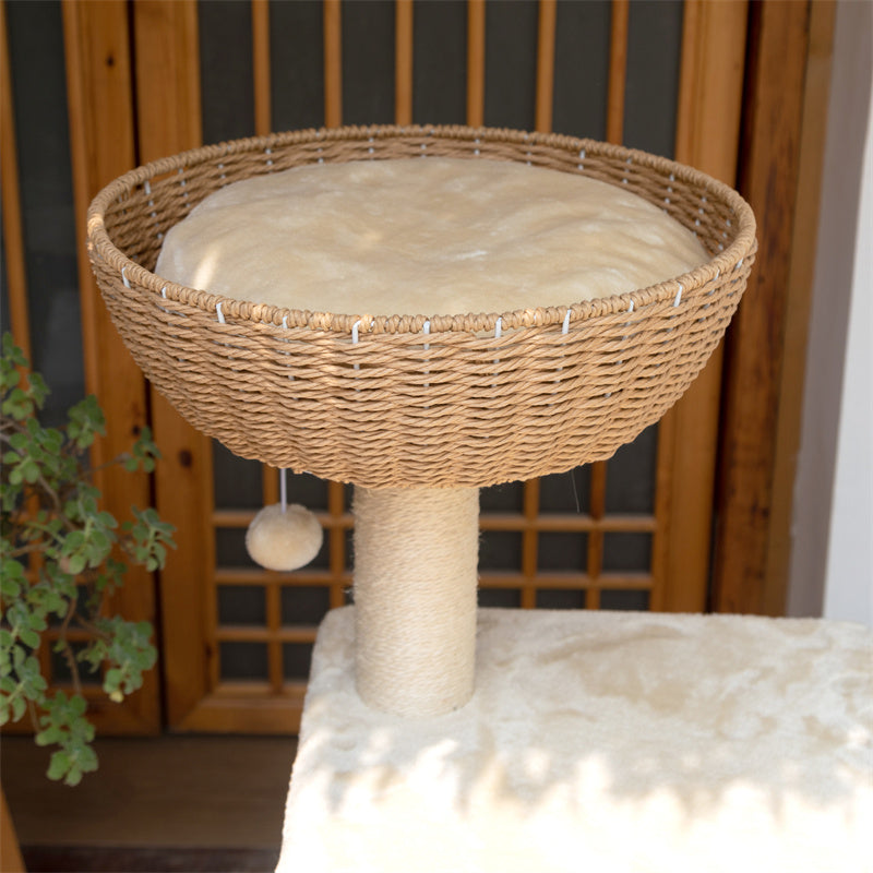 Top view of the woven nest on the Brown Rattan Cat Tree, featuring a soft cushion inside.