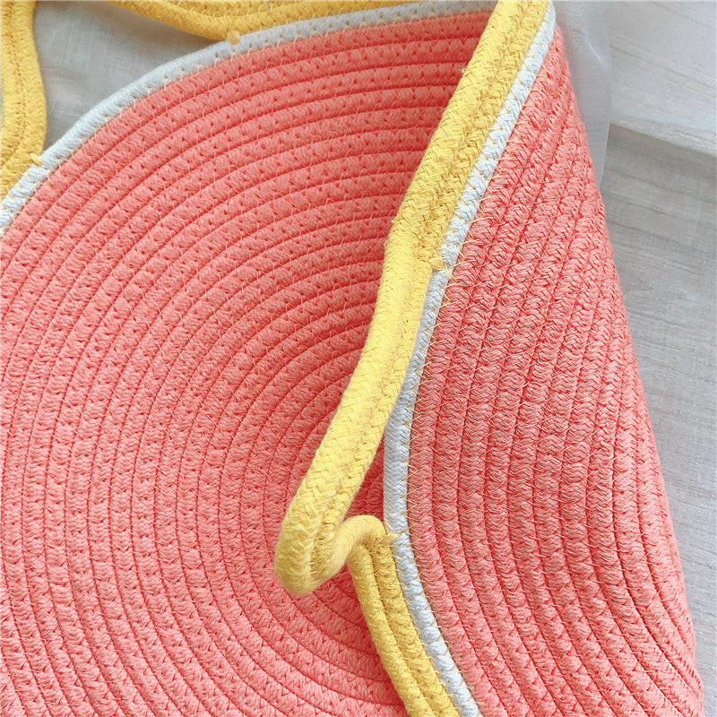 Close-up of the back side of the Cat Ear Shaped Cat Scratching Pad, showing the texture and material.