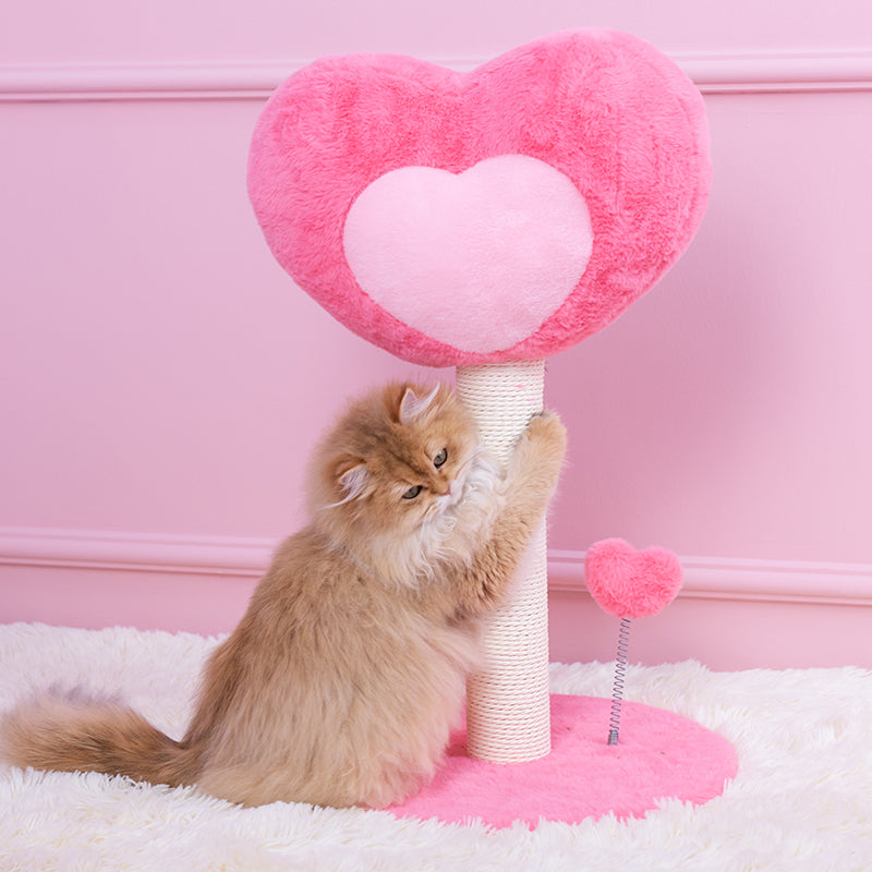 Cat scratching the sisal rope on the Hit Your Heart Cat Tree Heart style.