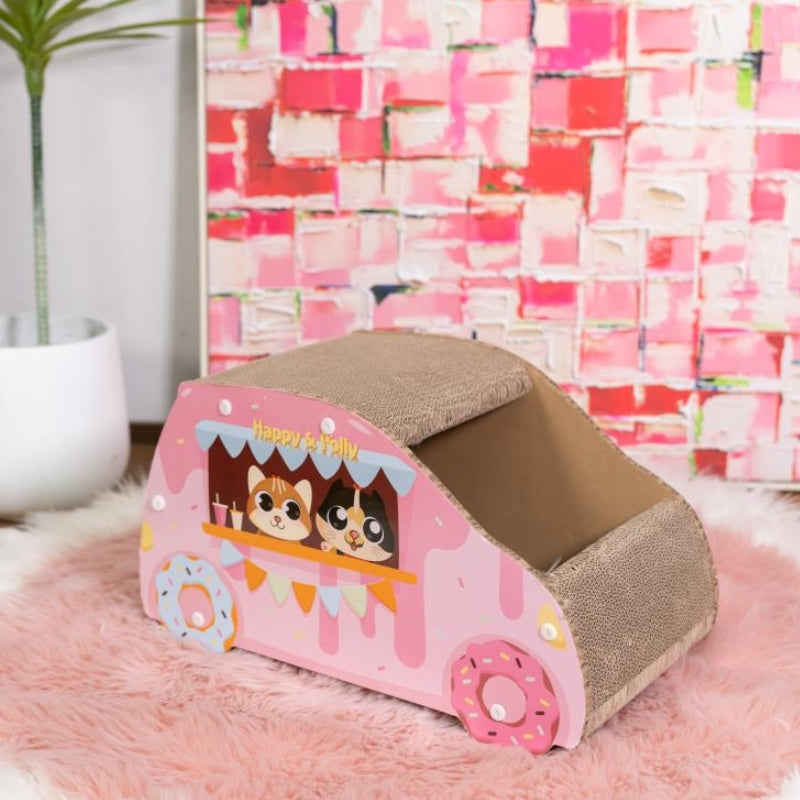 Top side view of the Donut Car Cat Scratcher placed in a living room, blending with home decor.