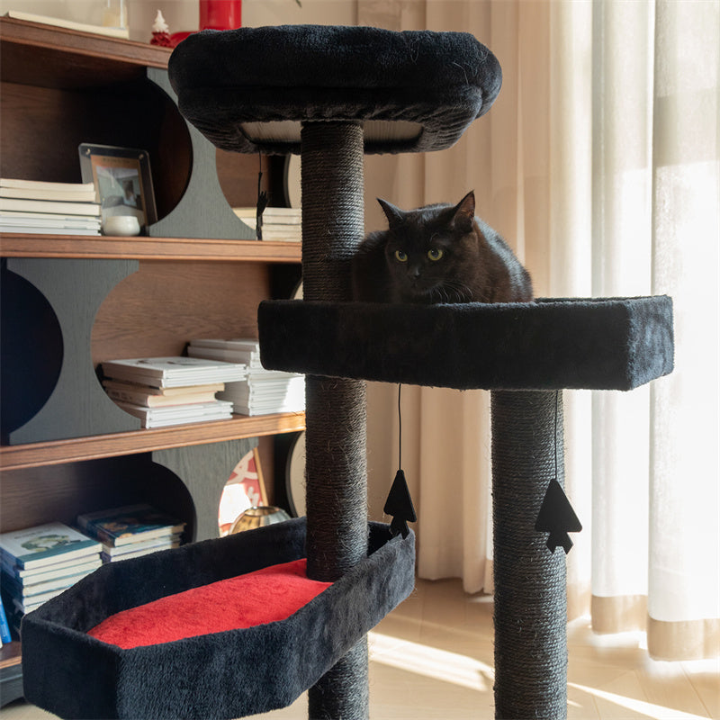 A cat on the coffin platform of the Gothic Style Cat Tree