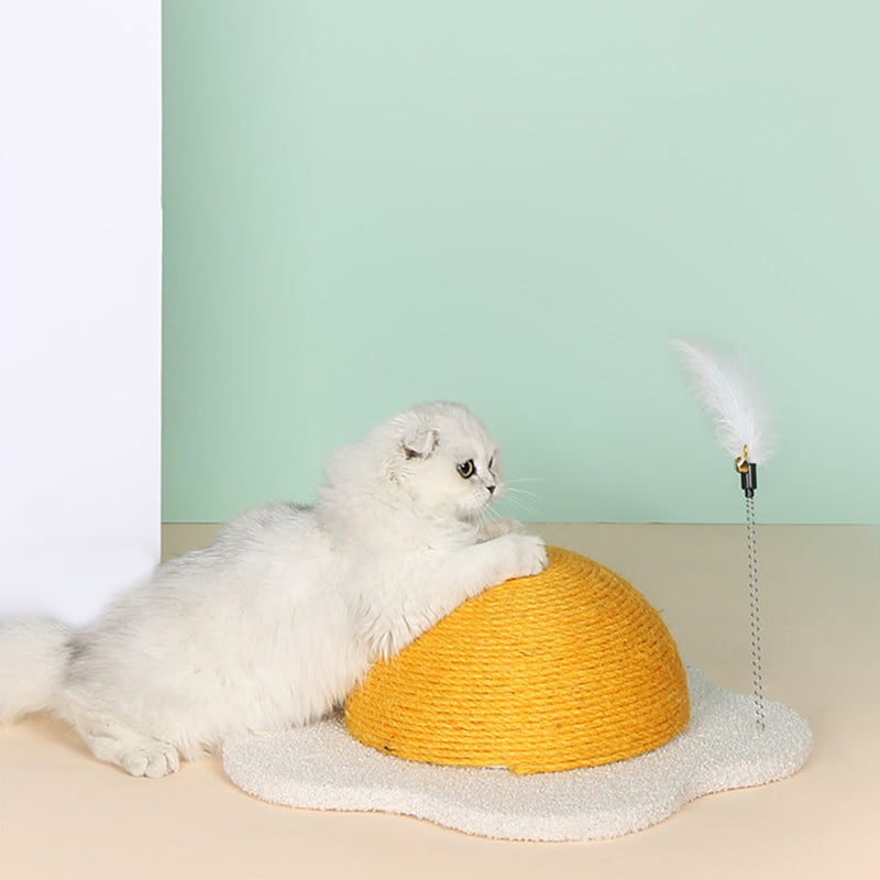 A kitten scratching the Egg Series Cat Sisal Scratcher Toy, side view showing its size and durability.