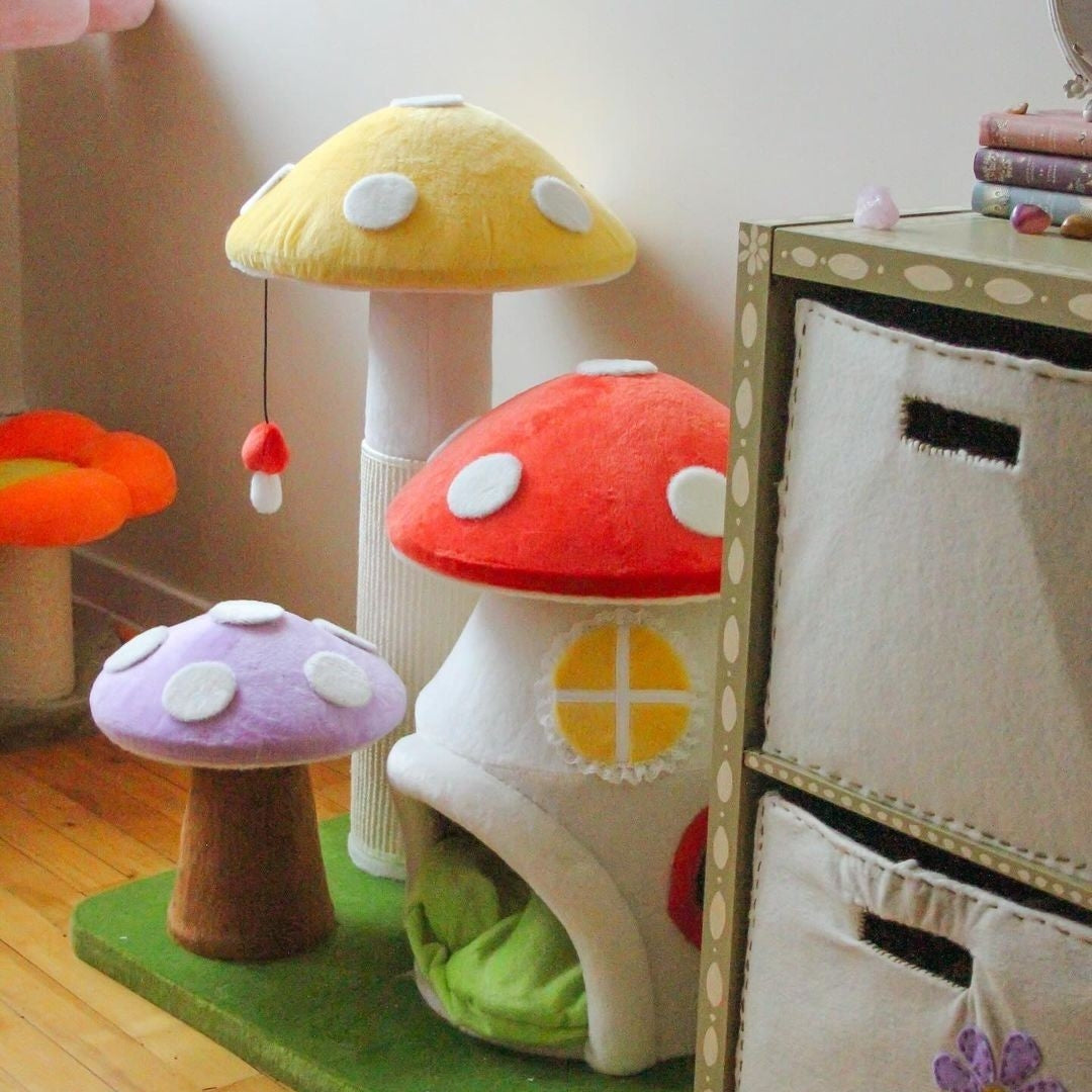 Magic Mushroom Cat Tree placed beside a cabinet