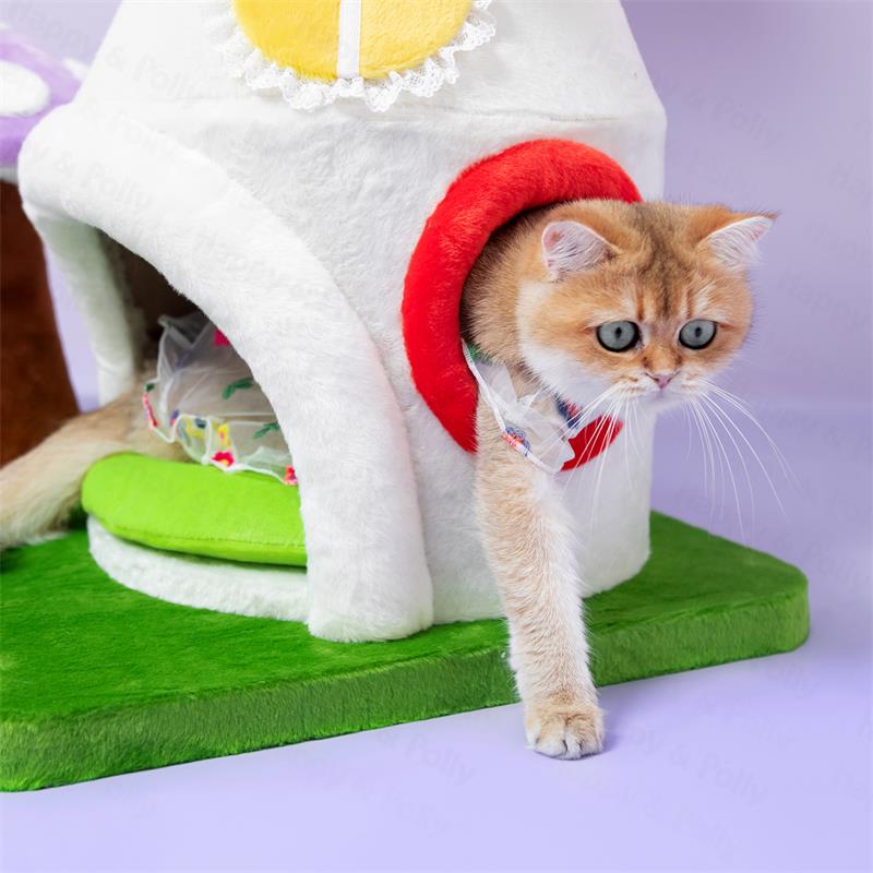 A cat walking out from the double-door condo of the Magic Mushroom Cat Tree