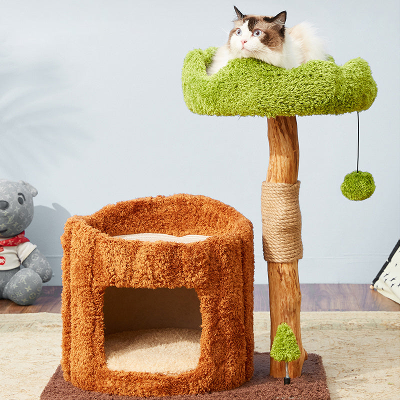 A Ragdoll cat lying on the Stylish Catnap Stump Cat Tree.