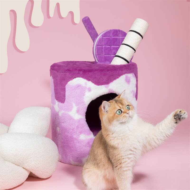 A cat playing in front of the Taro Milk Tea Cat Tree